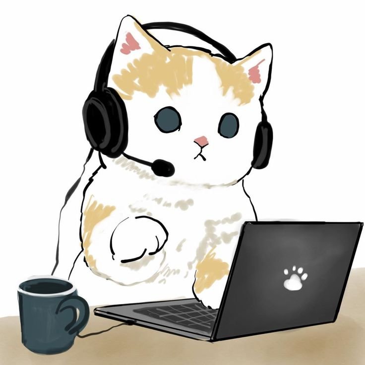 Кот в наушниках за компьютером